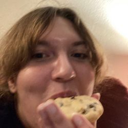 Katy eating a cookie